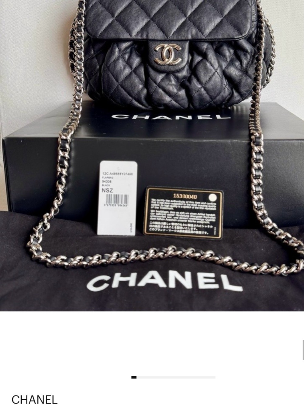 CHANEL Black Quilted Lambskin Mini Flap Crossbody with Silver Chain